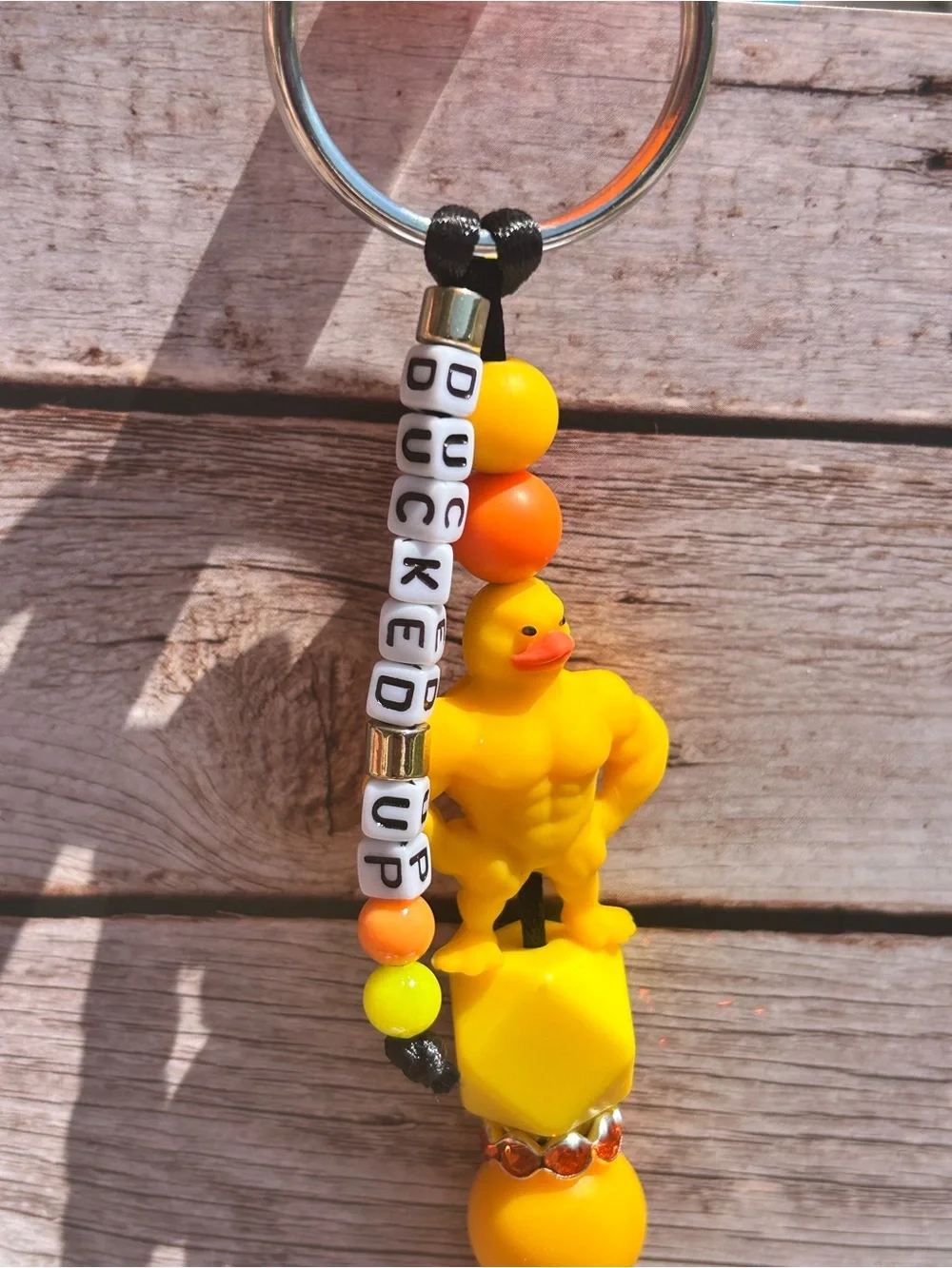 Yellow Muscular Rubber Duck Keychain with handmade letter bead strand